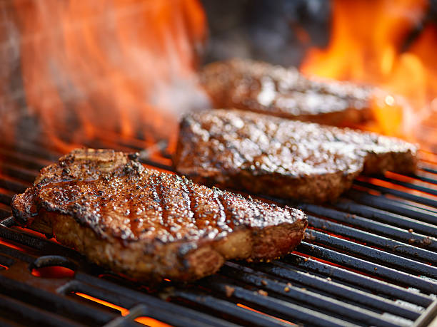 grilling steak on gas grill